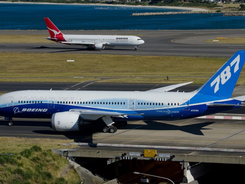 The old and the new: A Boeing 787 and Qantas Boeing 767 pass at Sydney Airport